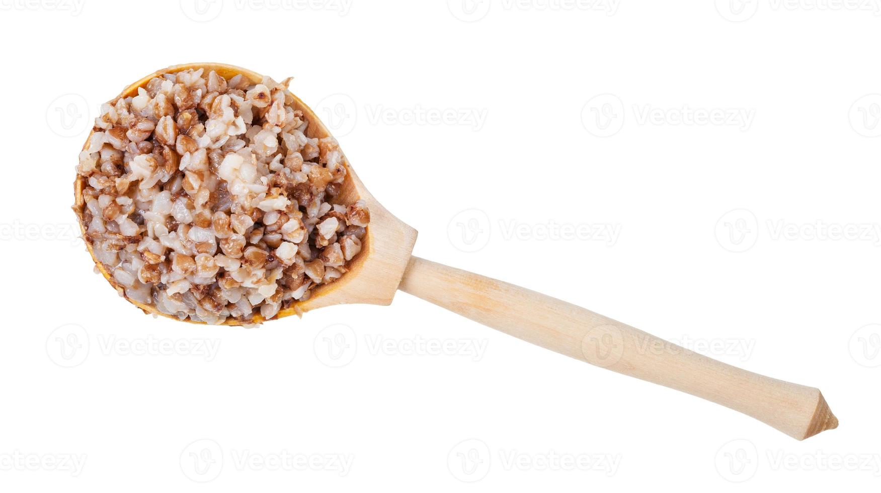 superiore Visualizza di grano saraceno porridge nel di legno cucchiaio foto