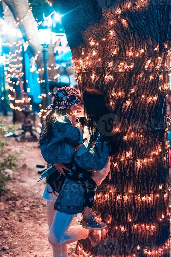 famiglia è la spesa tempo nel il sera parco foto