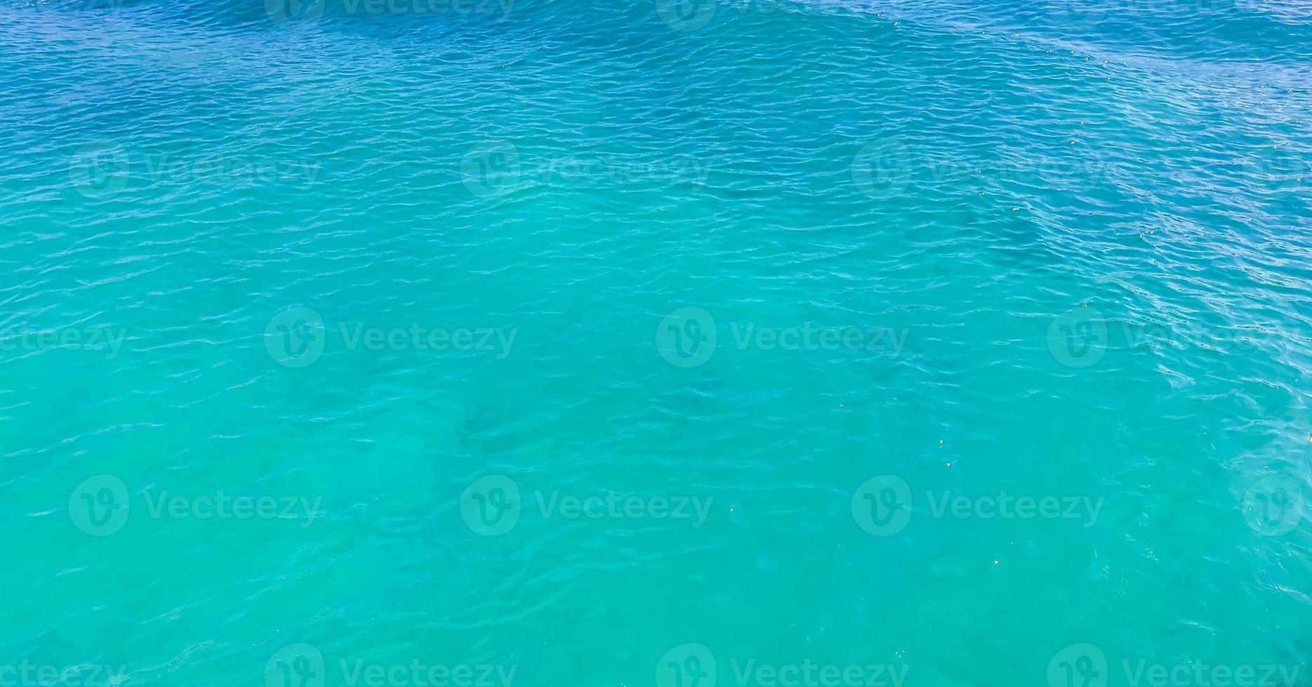 blu turchese acqua onde oceano e mare struttura modello Messico. foto