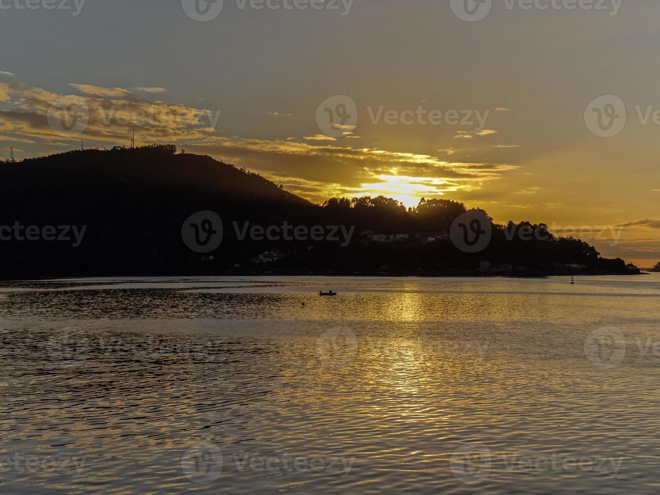 ultimo raggi di luce del sole foto