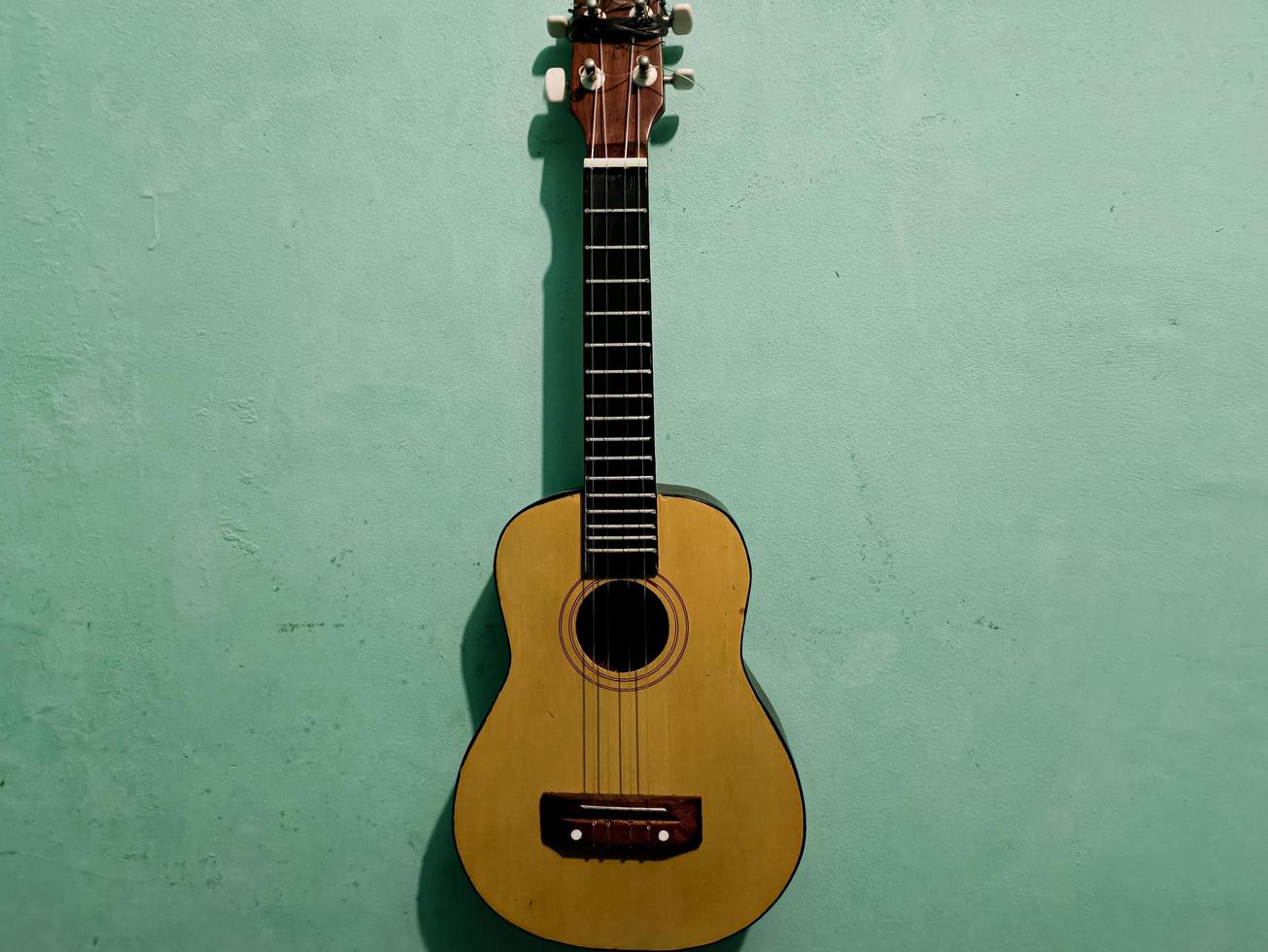 ukulele chitarra è generalmente Usato per strumenti foto