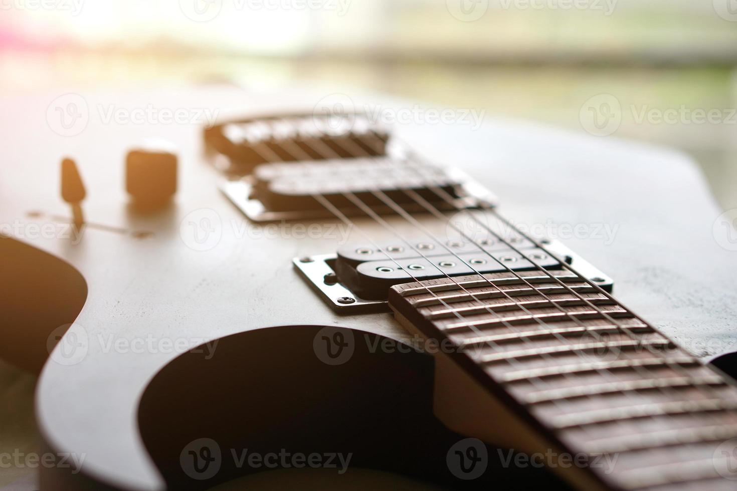 chitarra elettrica, usata per suonare musica e note, per cantare una canzone, macro abstract foto