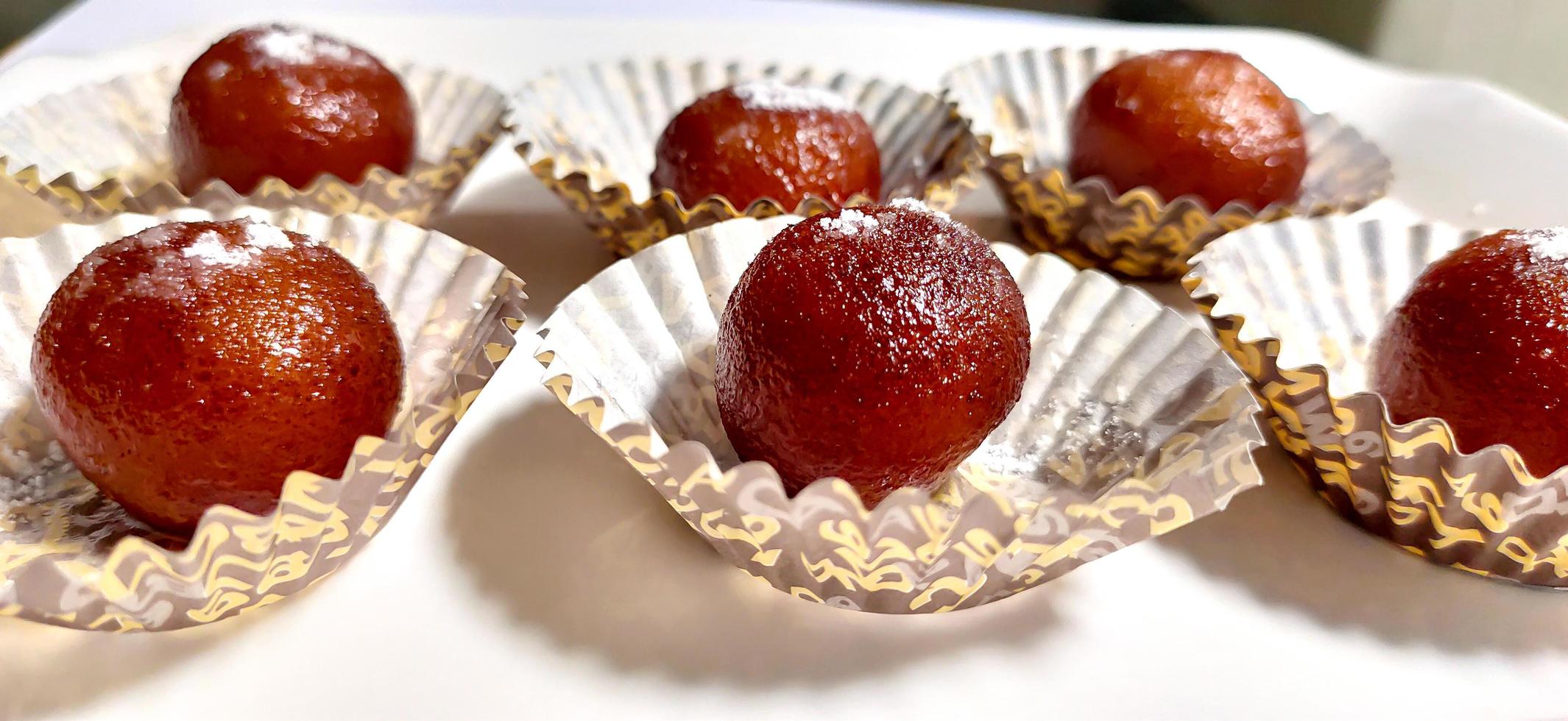 indiano dolce gulab Jamun è un' sciropposo dolce popolare nel India foto