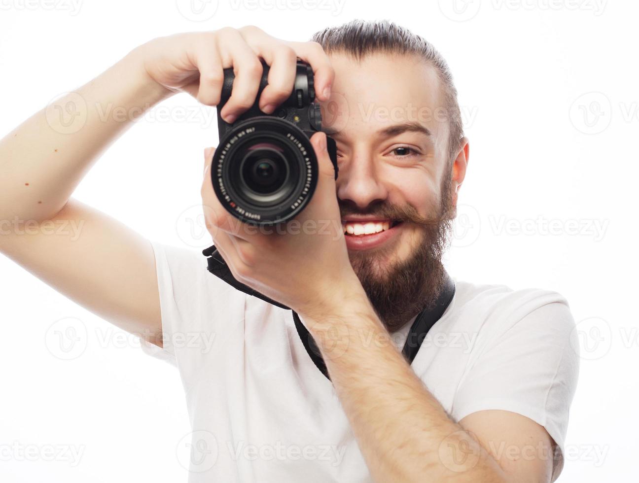 giovane fotografo barbuto foto