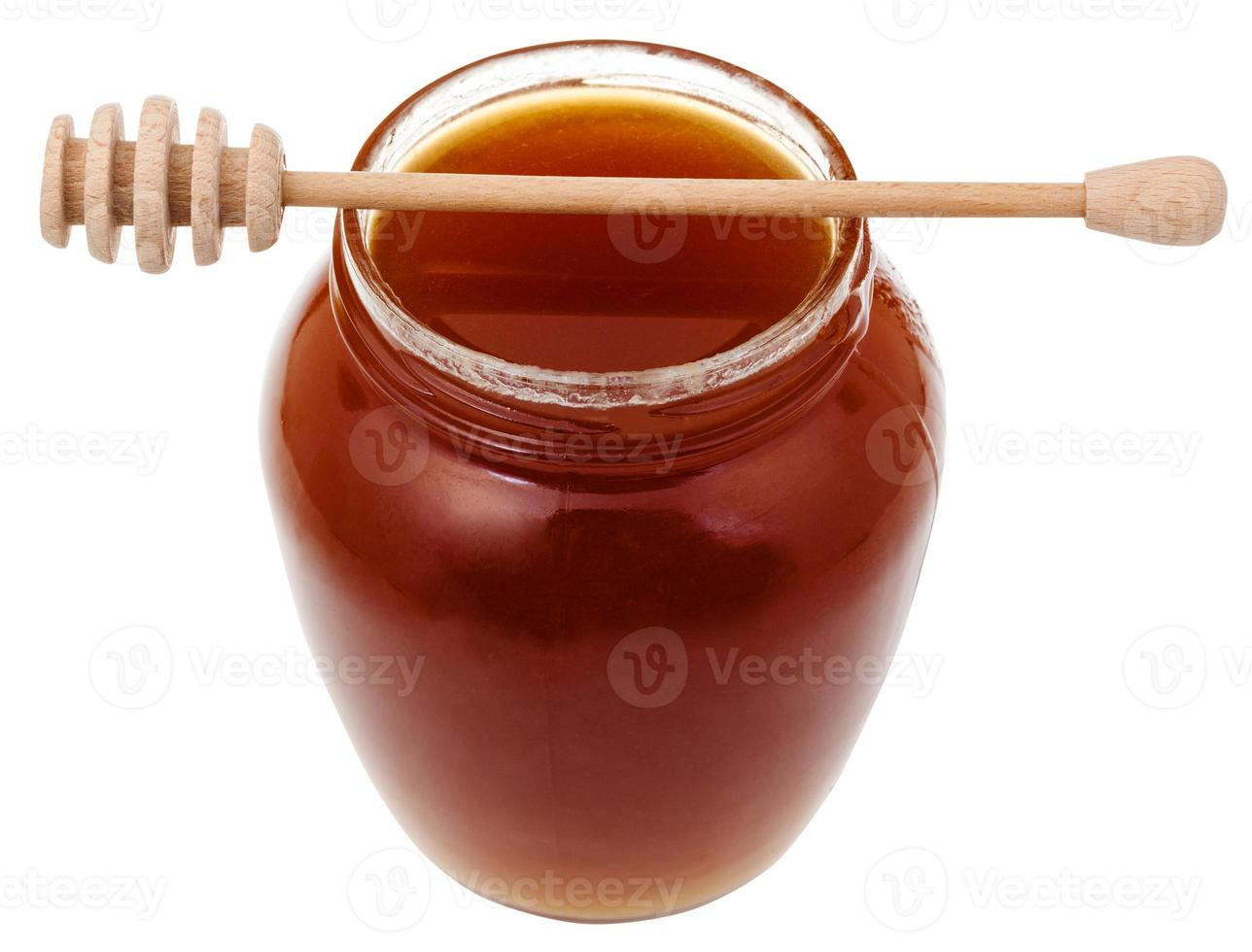 bicchiere vaso con Marrone miele e di legno bastone foto