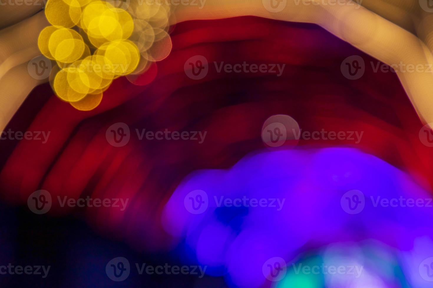 d'oro rosso viola defocus astratto bokeh leggero effetti su il notte nero sfondo struttura foto