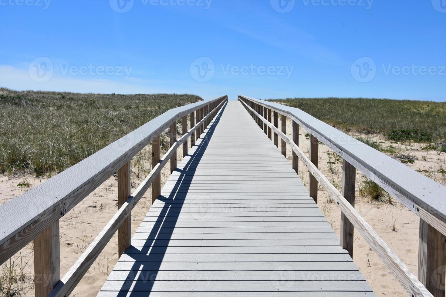 lungo camminare modo al di sopra di spiaggia dune su il capo foto