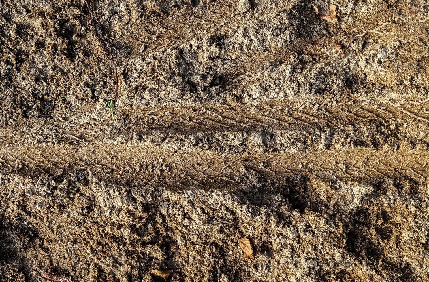 dettagliato vicino su Visualizza su un' Marrone sabbia terra struttura foto