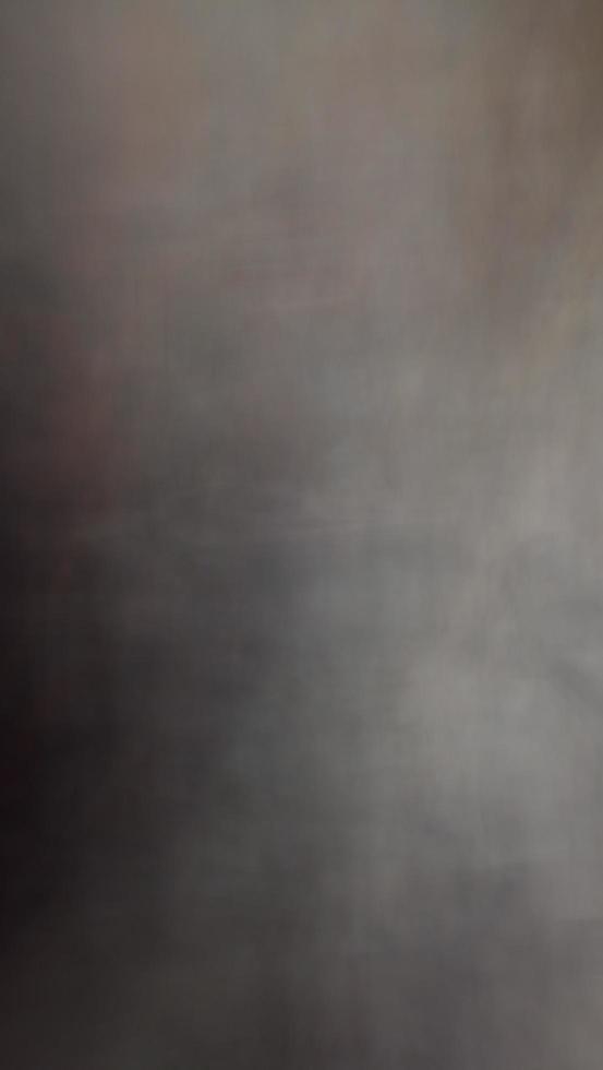 astratto sfocatura sfondo con Marrone grigio, Nero, bianca e terra toni. foto
