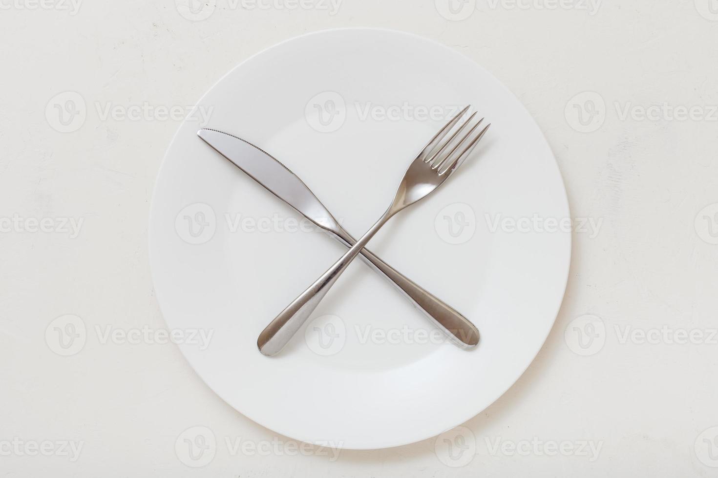 superiore Visualizza di bianca piatto con cucina su bianca foto