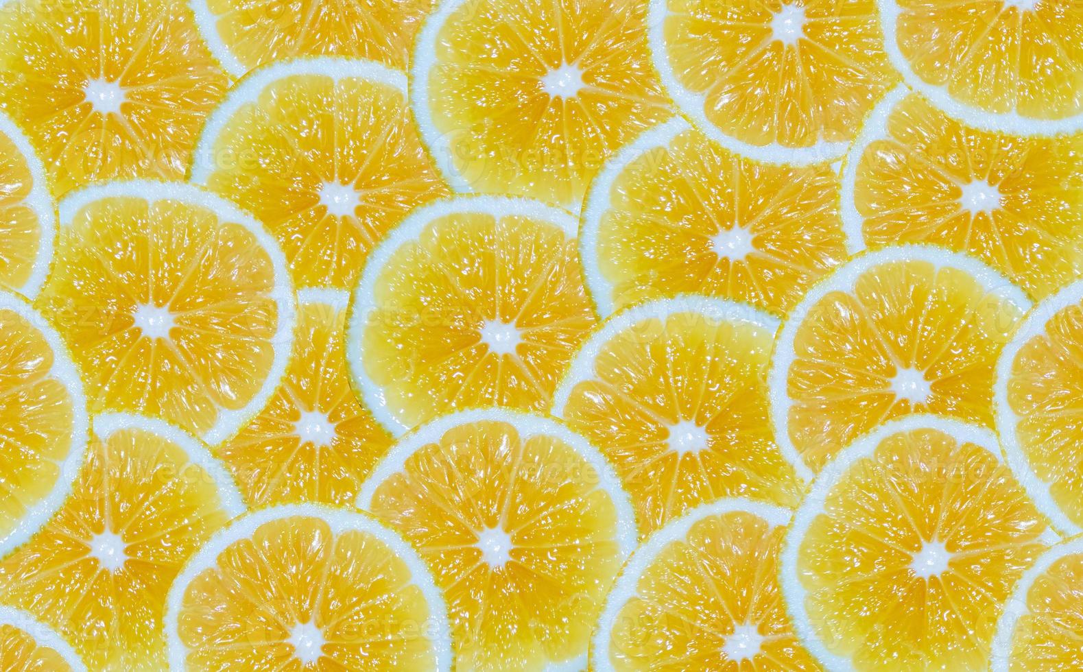 Limone fette sfondo. tagliare giallo agrume frutta. foto