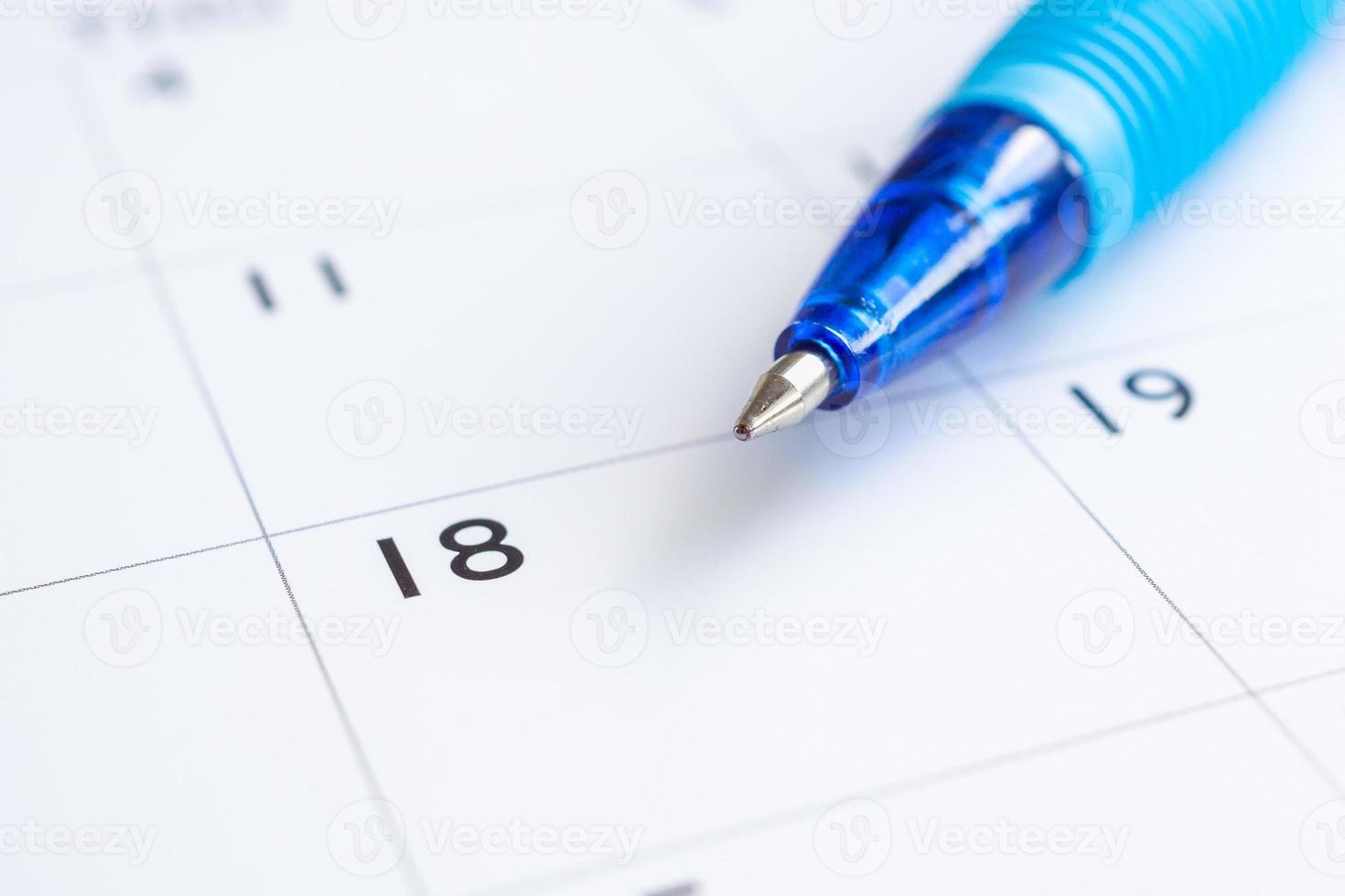 blu penna su calendario pagina sfondo attività commerciale pianificazione appuntamento incontro concetto foto