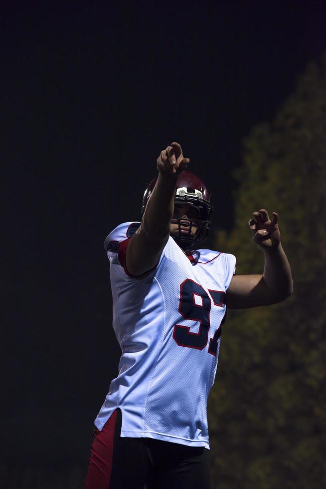 americano calcio giocatore lancio Rugby palla foto