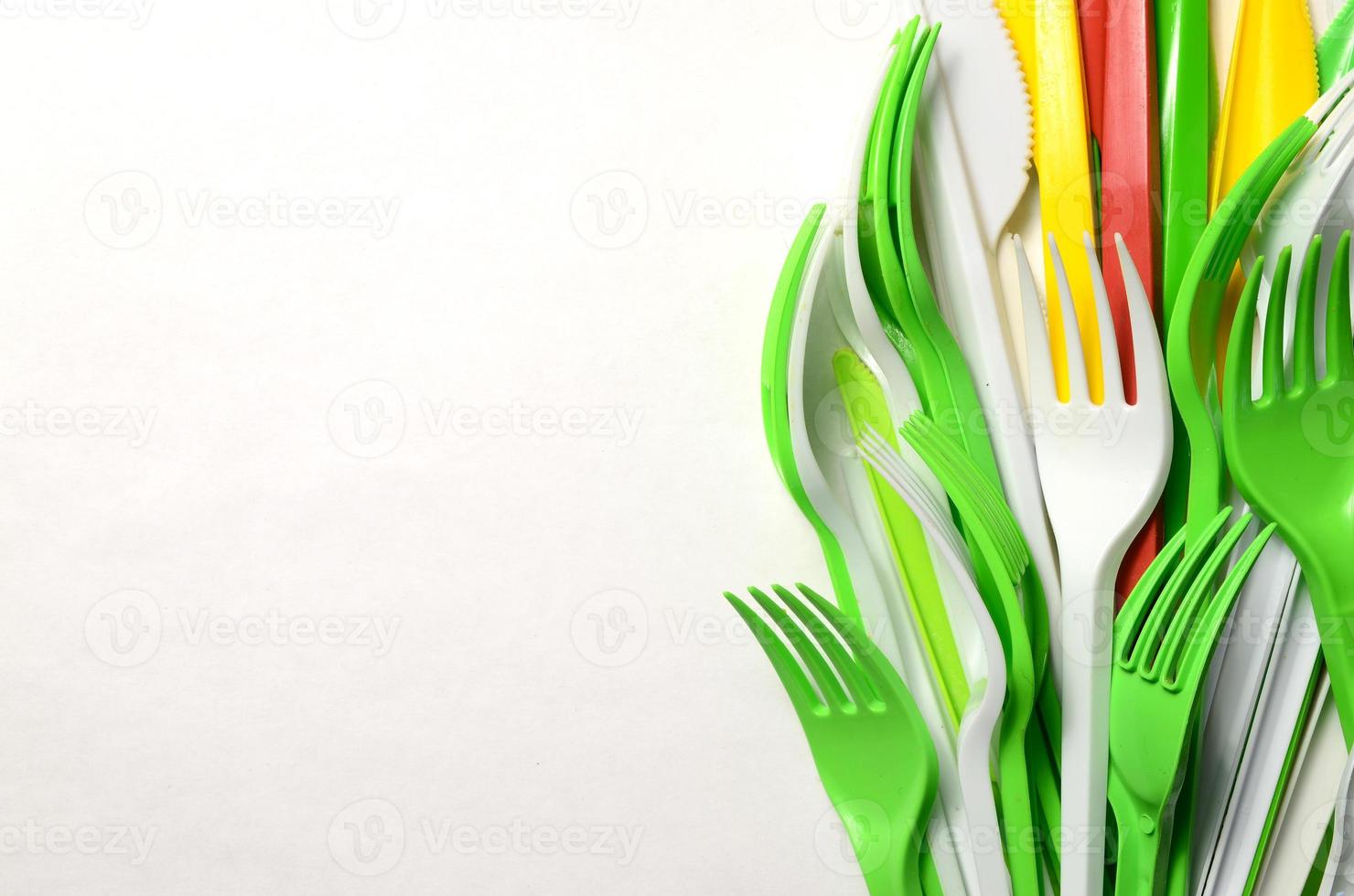 mucchio di luminosa giallo, verde e bianca plastica utensili da cucina singolo uso elettrodomestici foto