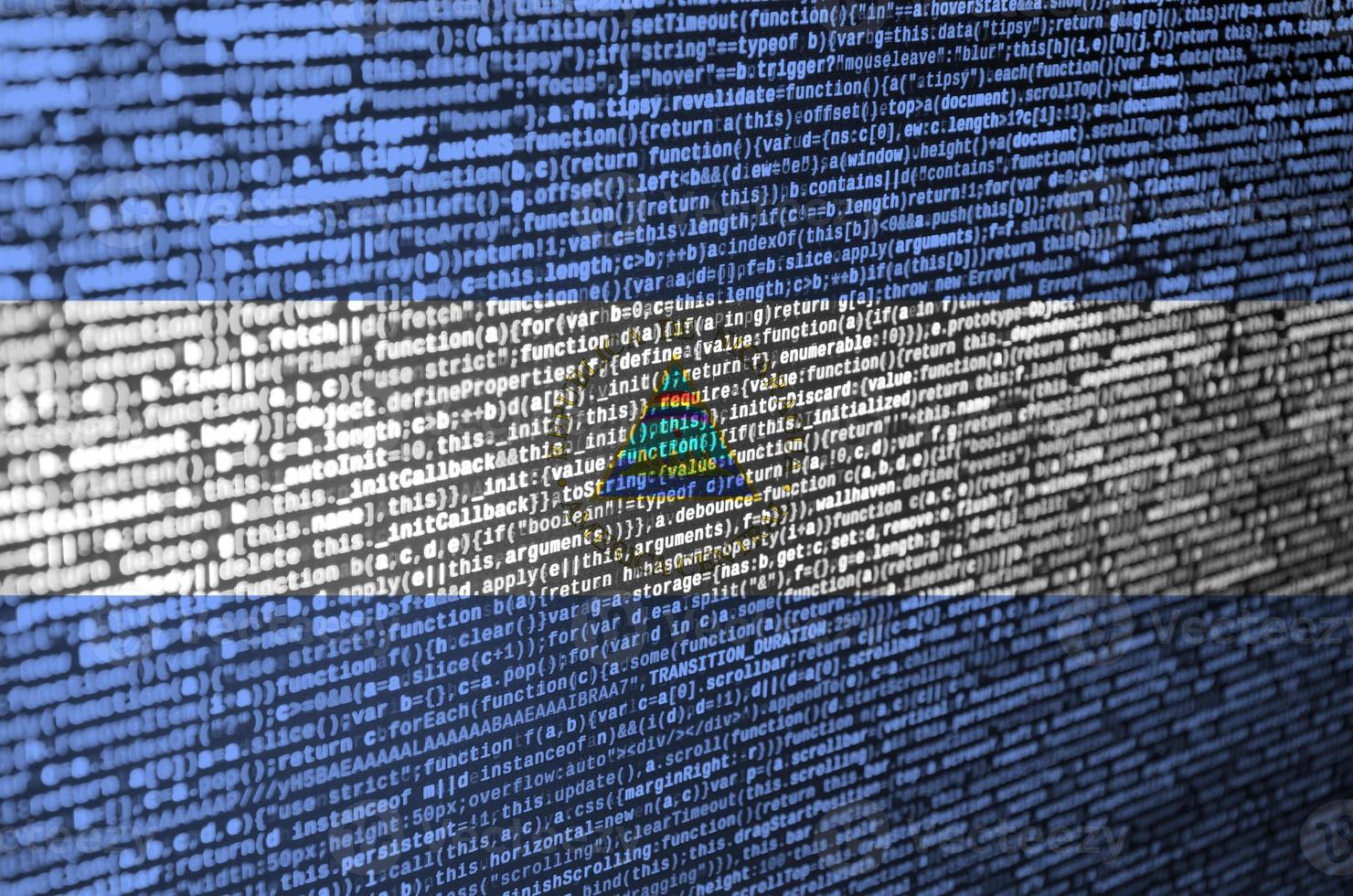 Nicaragua bandiera è raffigurato su il schermo con il programma codice. il concetto di moderno tecnologia e luogo sviluppo foto