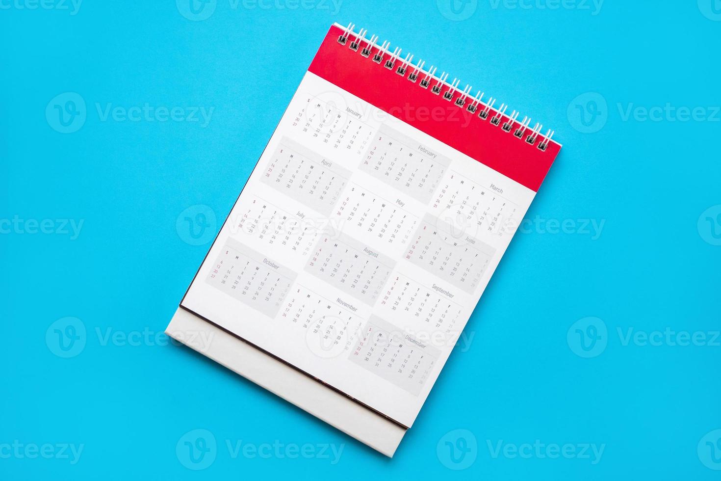 calendario pagina su blu sfondo attività commerciale pianificazione appuntamento incontro concetto foto