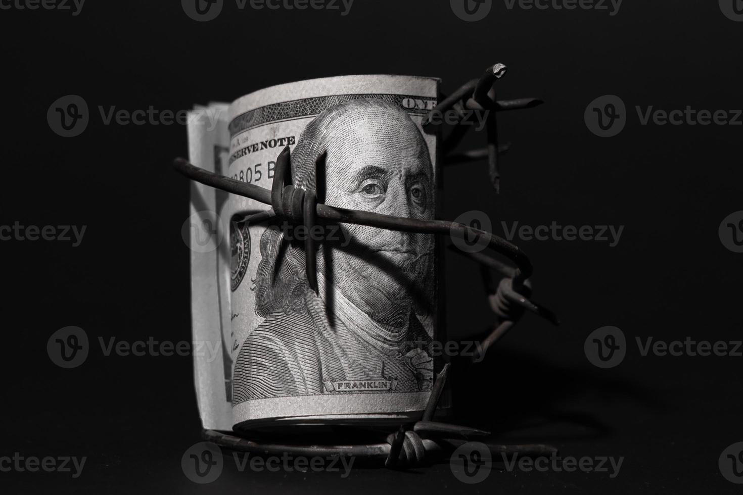 dollaro banconota con spinato filo, economico crisi, sfondo effetto con poco rumore foto