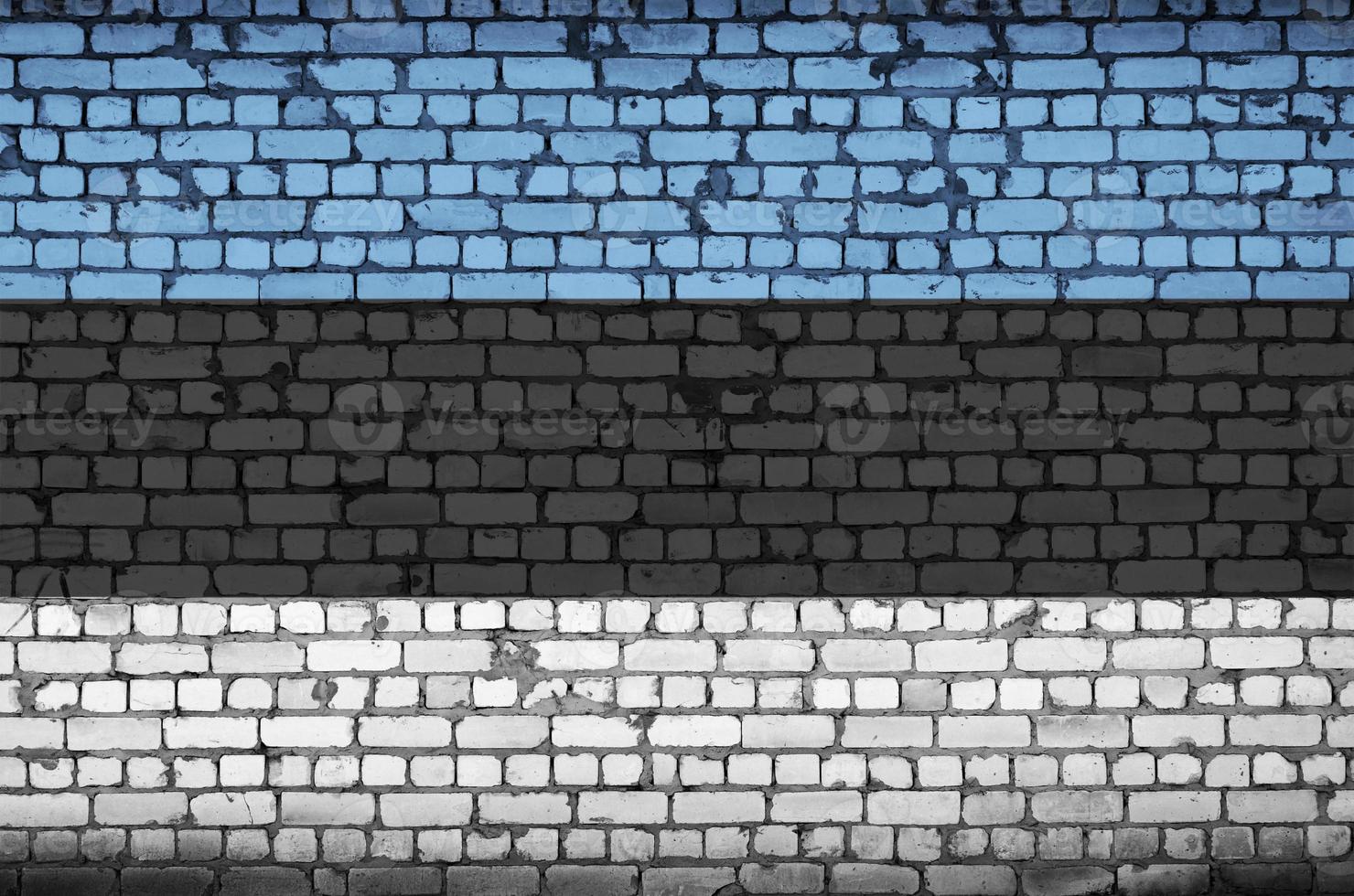 Estonia bandiera è dipinto su un vecchio mattone parete foto