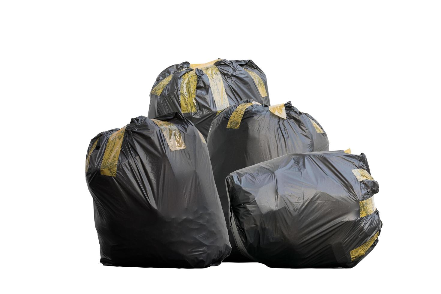 quattro sacchi della spazzatura neri foto