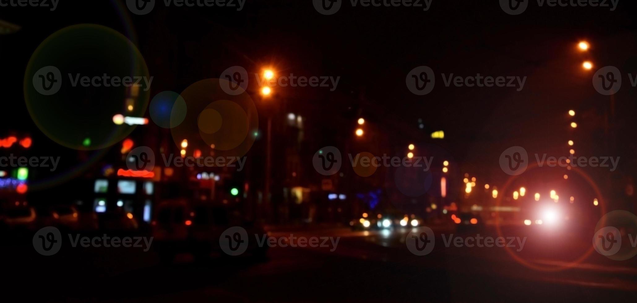 sfocato paesaggio di notte città foto