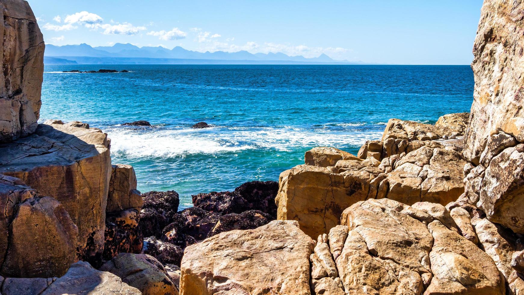 baia di plettenberg, isola faro, costa foto