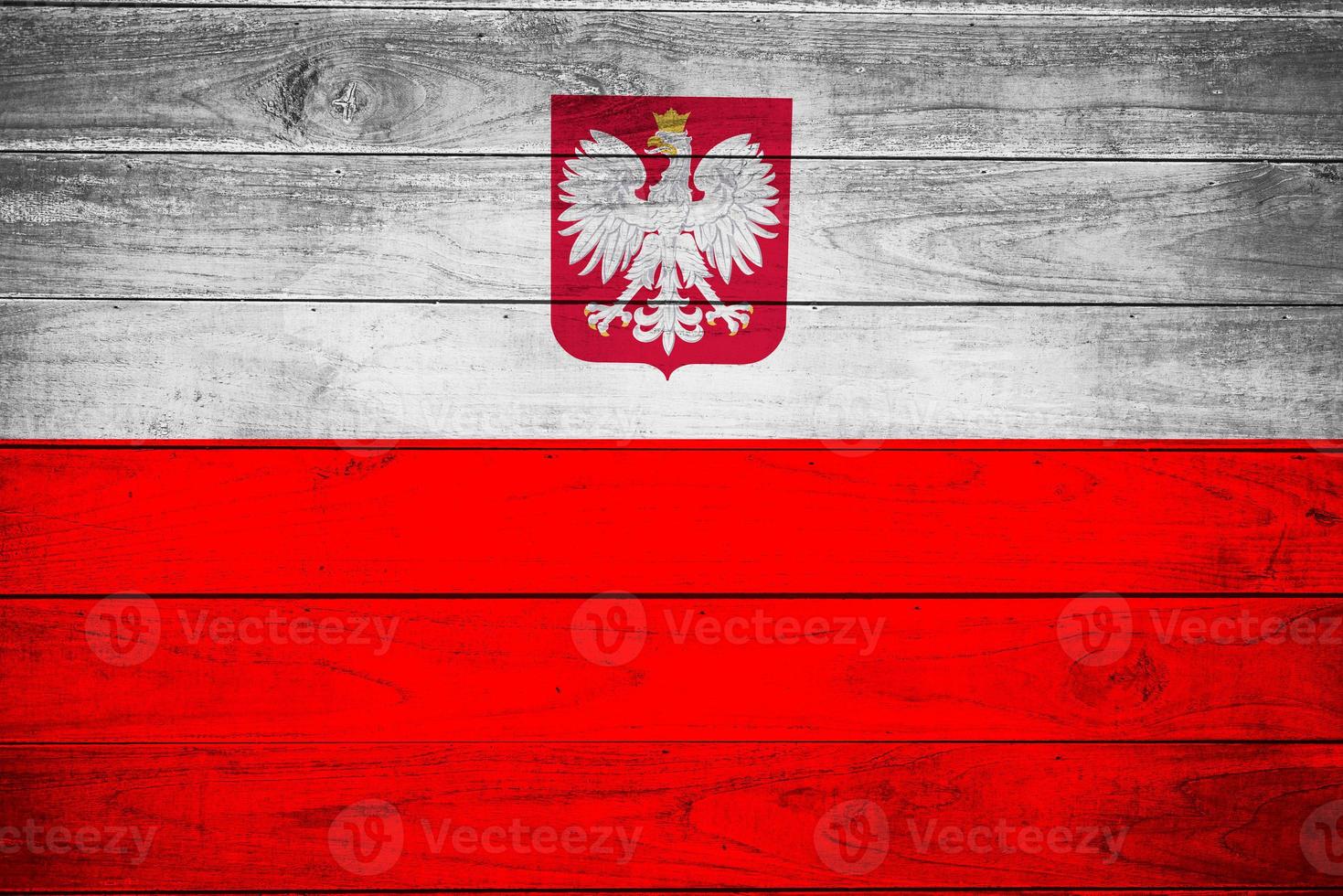 polacco bandiera con aquila su di legno parete foto