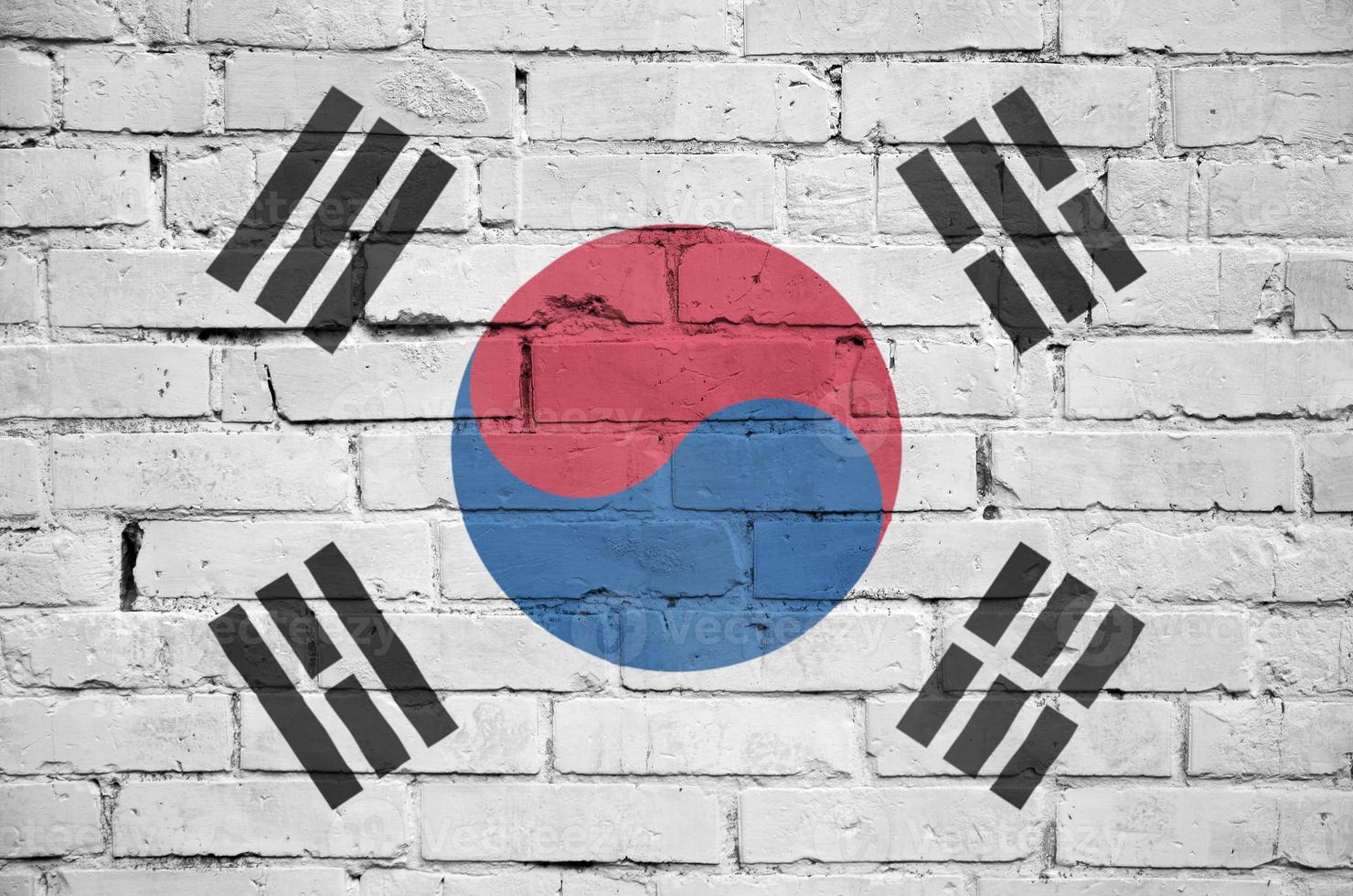 Sud Corea bandiera è dipinto su un vecchio mattone parete foto