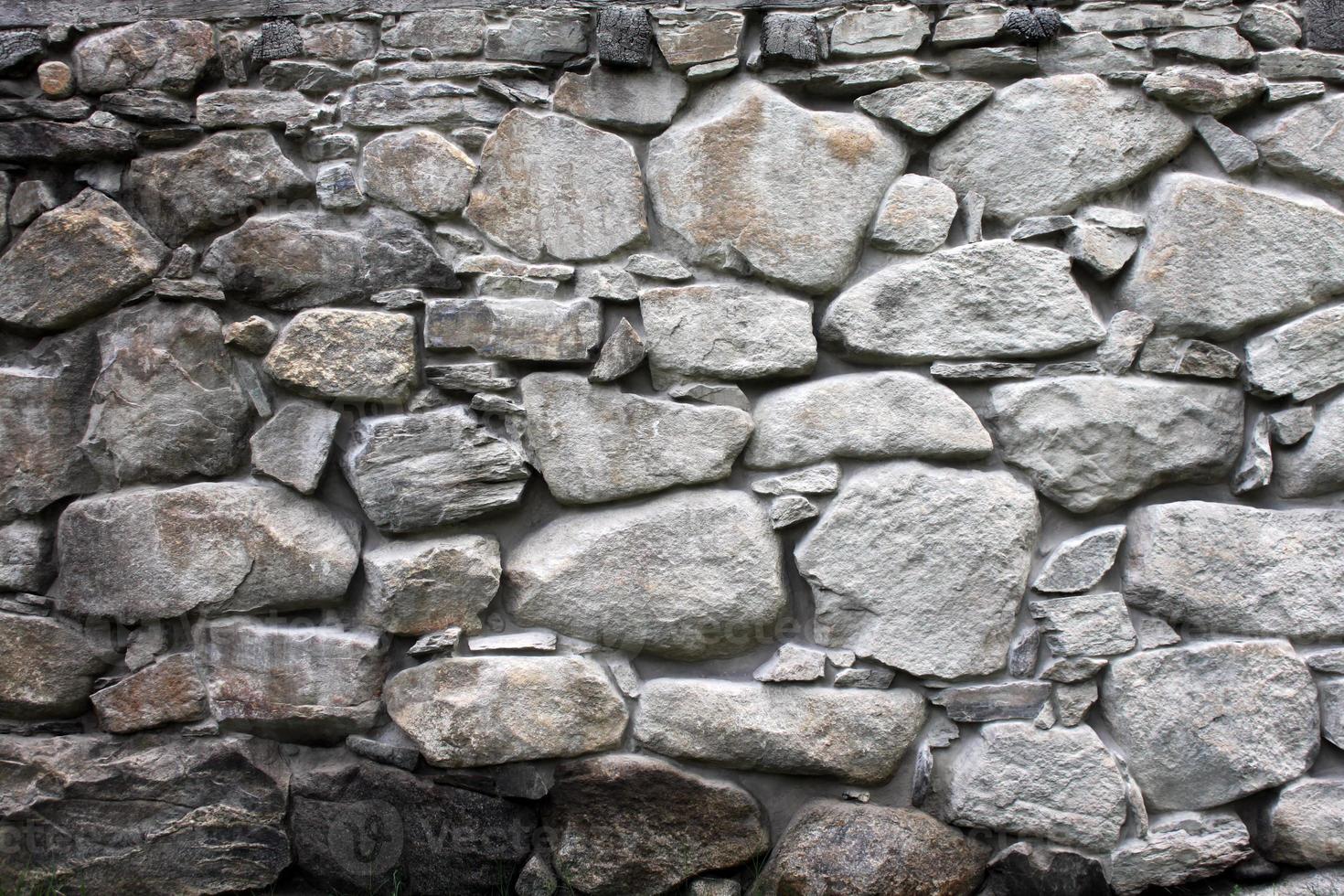 muro di pietra texture di sfondo foto