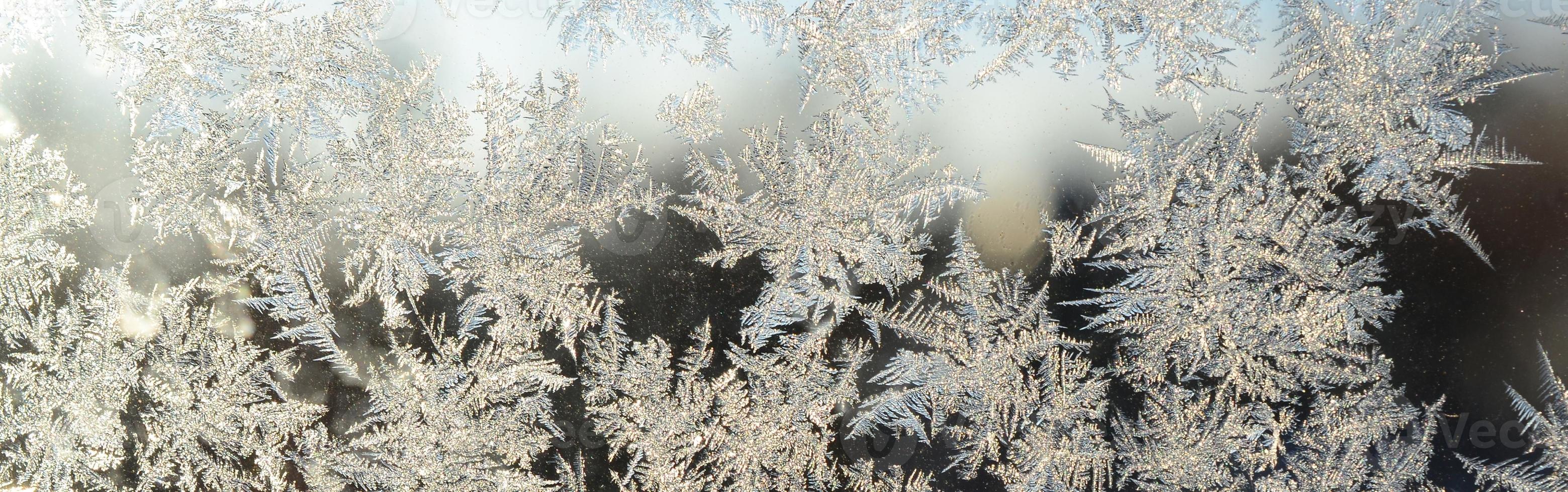 i fiocchi di neve brina brina macro su finestra bicchiere Pannello foto