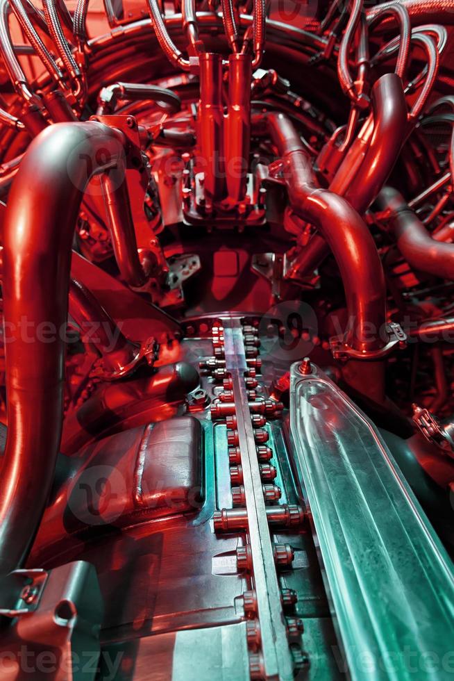 aereo turbina nel industriale disegno, motore per generando pulito energia nel un' futuristico rosso verde luce. foto