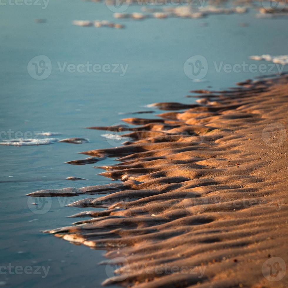 modelli nel il spiaggia sabbia foto