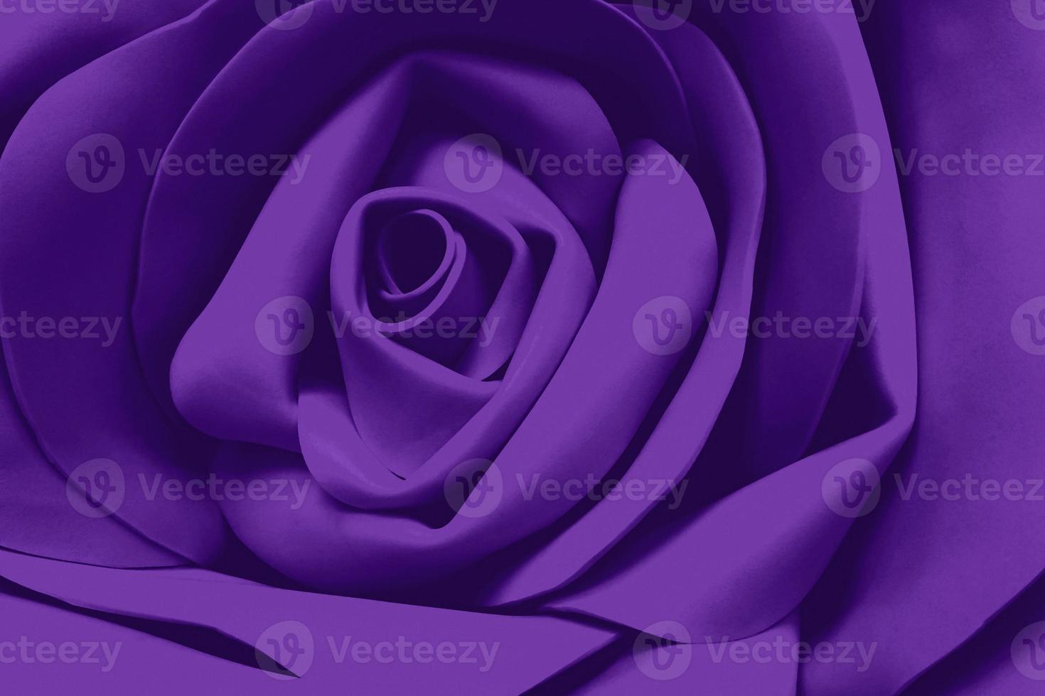 viola rosa strutturato sfondo, fatto a mano artificiale fiore avvicinamento foto