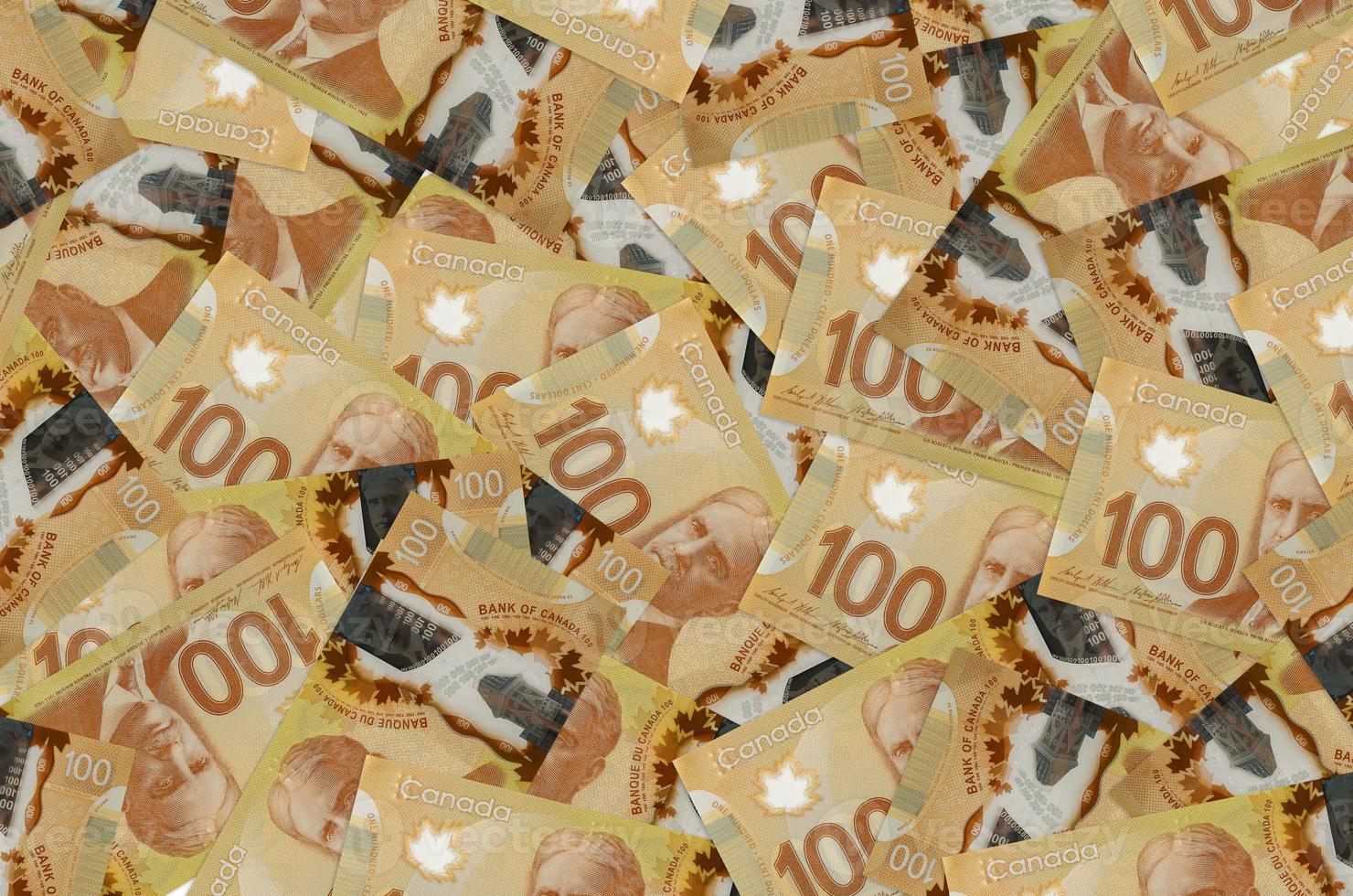 100 canadese dollari fatture bugie nel grande mucchio. ricco vita concettuale sfondo foto
