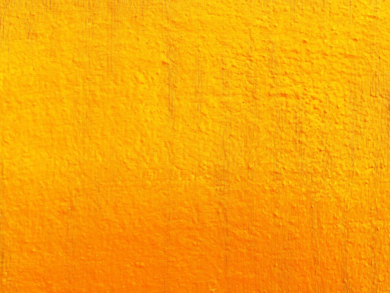 senza soluzione di continuità struttura di giallo cemento vecchio parete un' ruvido superficie, con spazio per testo, per un' sfondo. foto