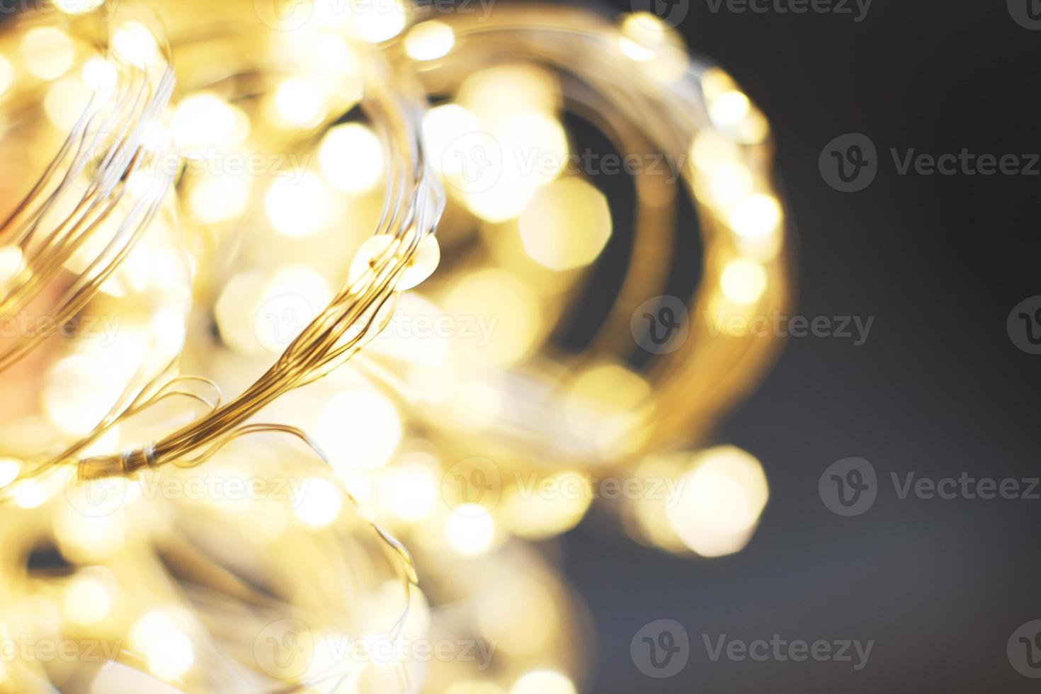 Natale bellissimo brillante oro sfondo. scintillare festivo sfocato bokeh foto