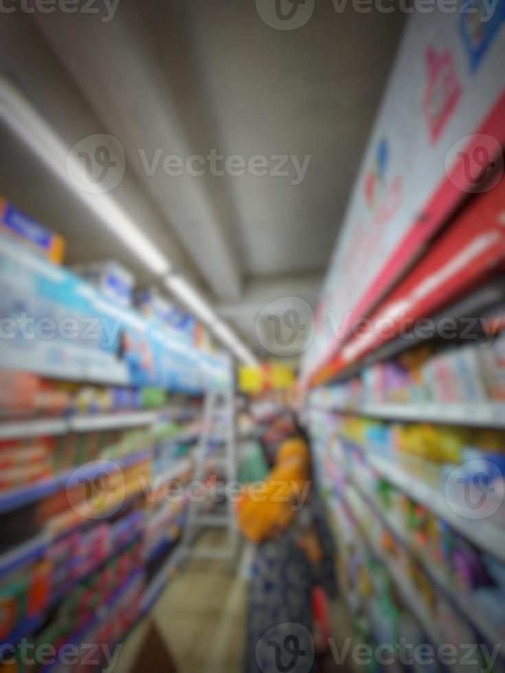 Questo è un' sfocatura foto di un' supermercato o centro commerciale storefront