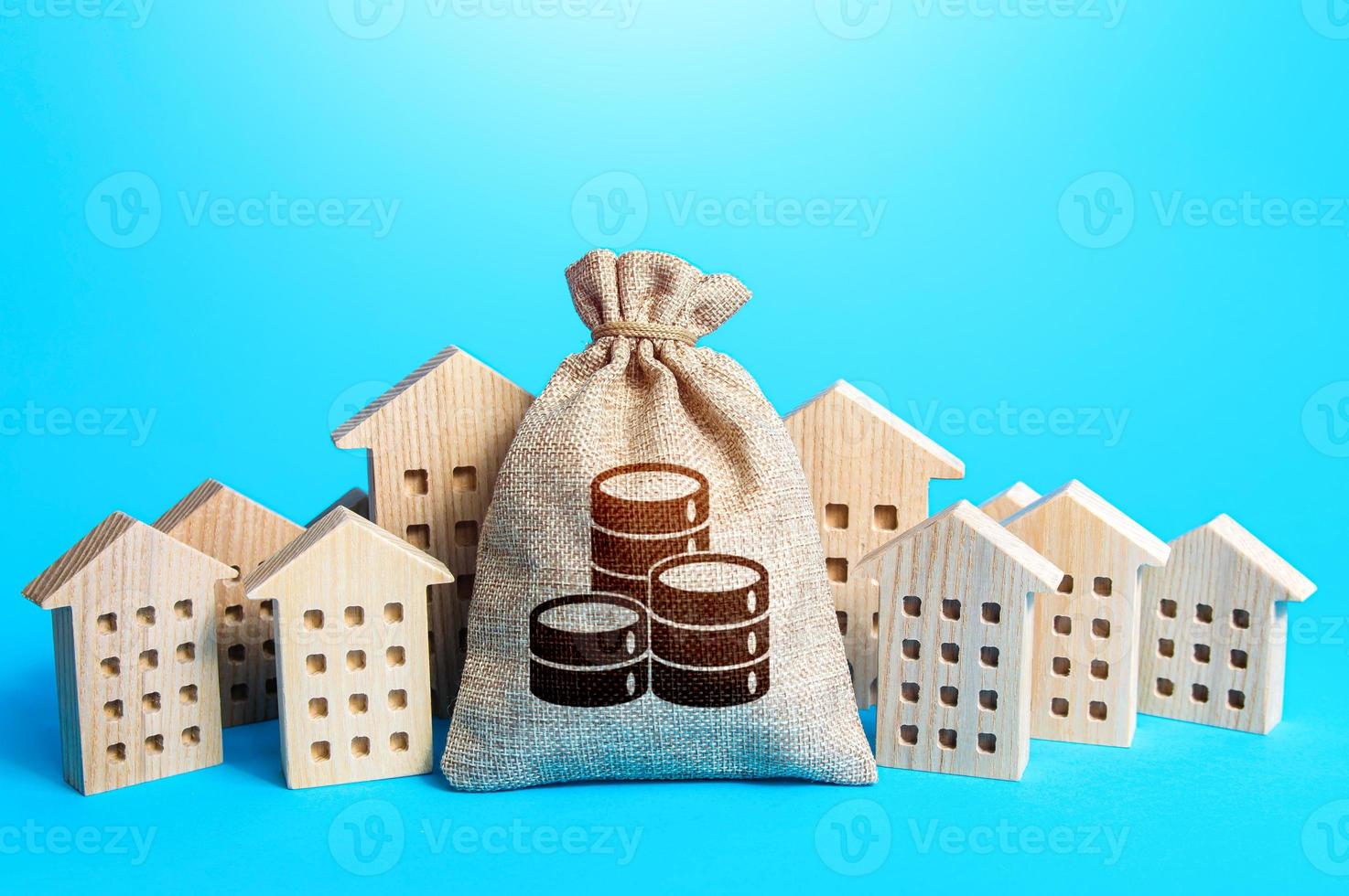 i soldi Borsa tra cittadina case figurine. comunale bilancio. ricco città. noleggio attività commerciale. agente immobiliare Servizi. vendita di vero proprietà. proprietà le tasse. imposta collezione, investimento nel città sviluppo. foto