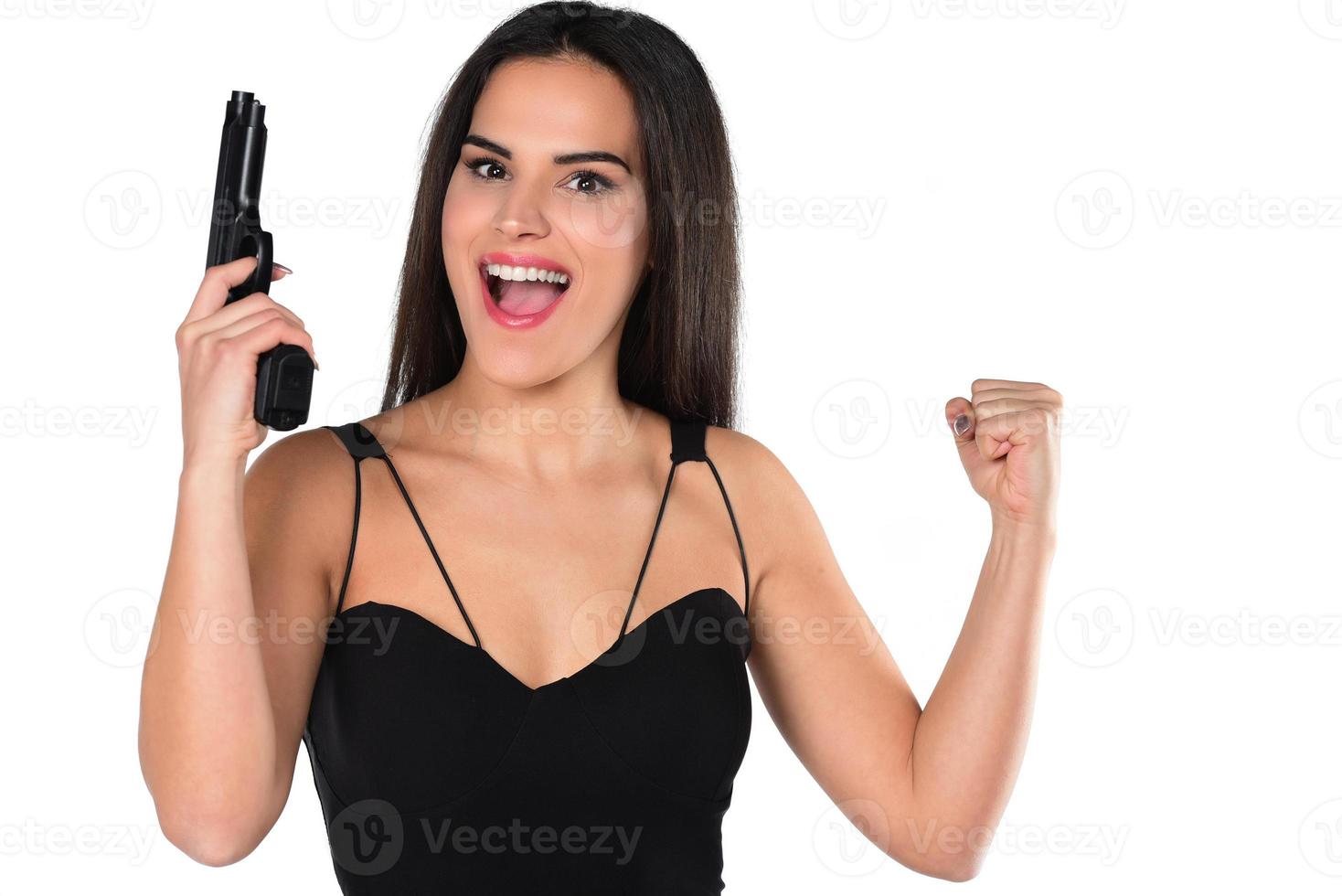 bellissimo pericoloso donne Tenere un' pistola foto