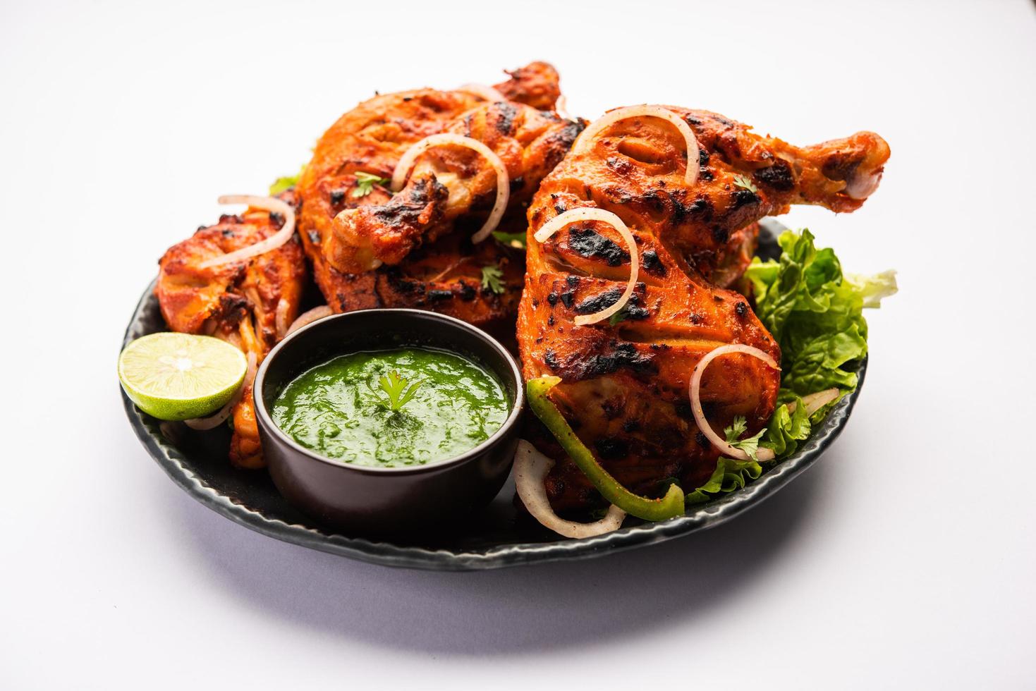 tandoori pollo è un indiano non vegetariano speziato cibo foto