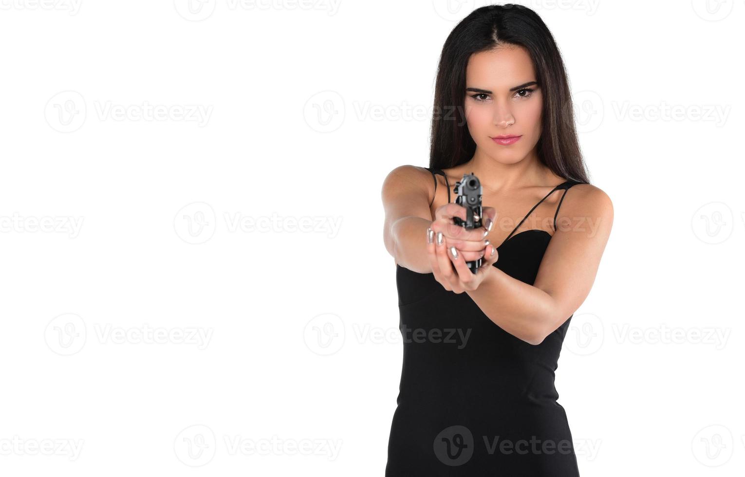 bellissimo pericoloso donne Tenere un' pistola foto