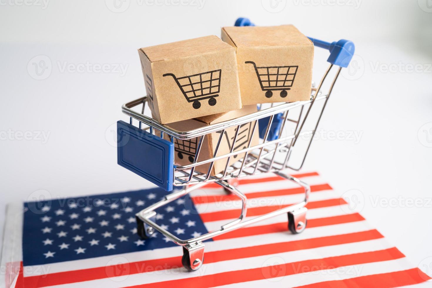 scatola con logo del carrello della spesa e bandiera usa america, import export shopping online o e-commerce servizio di consegna finanza negozio spedizione prodotto, commercio, concetto fornitore. foto