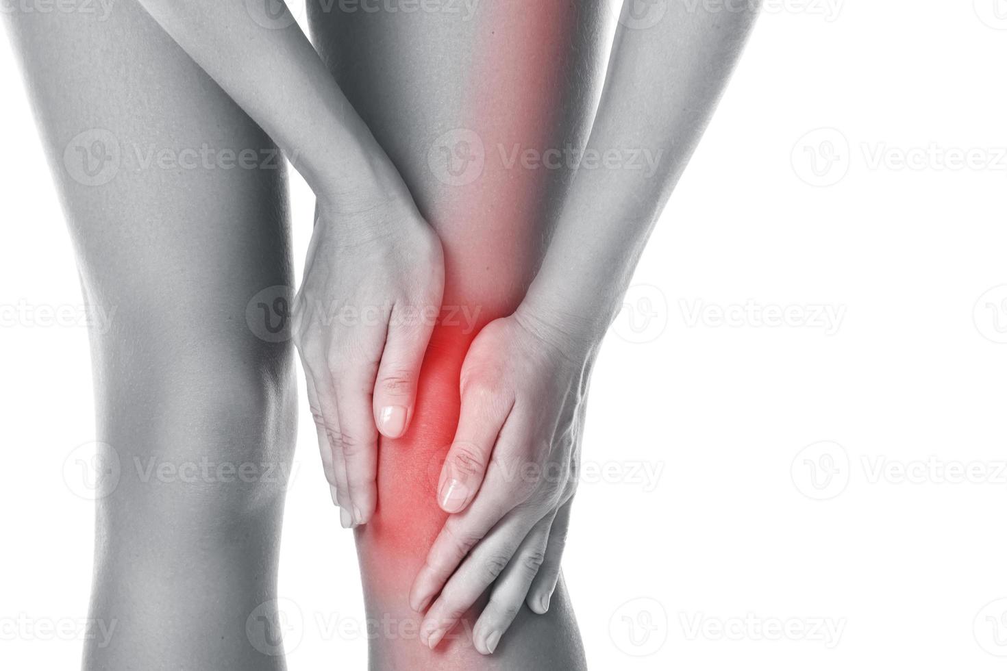 donna con un' fonte di dolore nel sua ginocchio foto