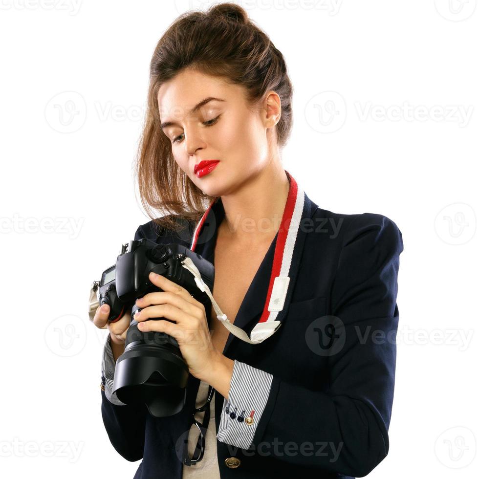 donna fotografo con un' dslr telecamera su bianca sfondo foto