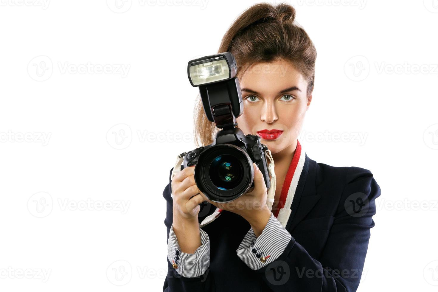 donna fotografo con un' dslr telecamera su bianca sfondo foto