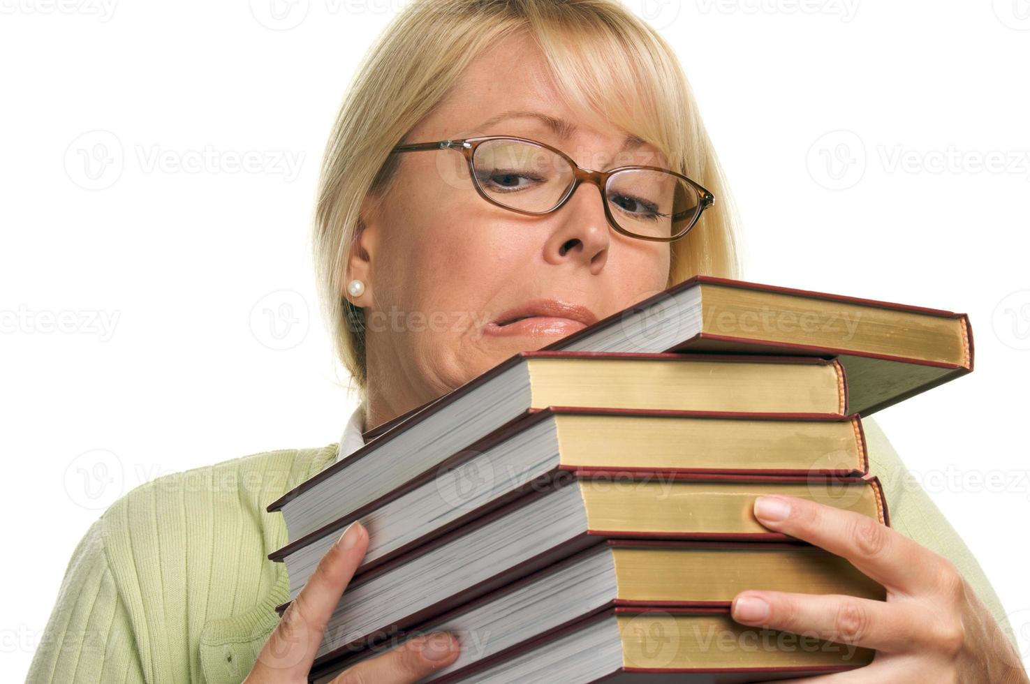attraente alunno lotte con sua libri foto