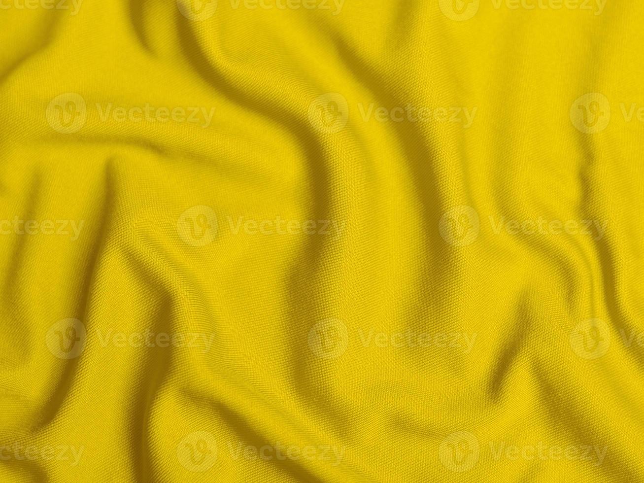 giallo velluto tessuto struttura Usato come sfondo. vuoto giallo tessuto sfondo di morbido e liscio tessile Materiale. Là è spazio per testo foto