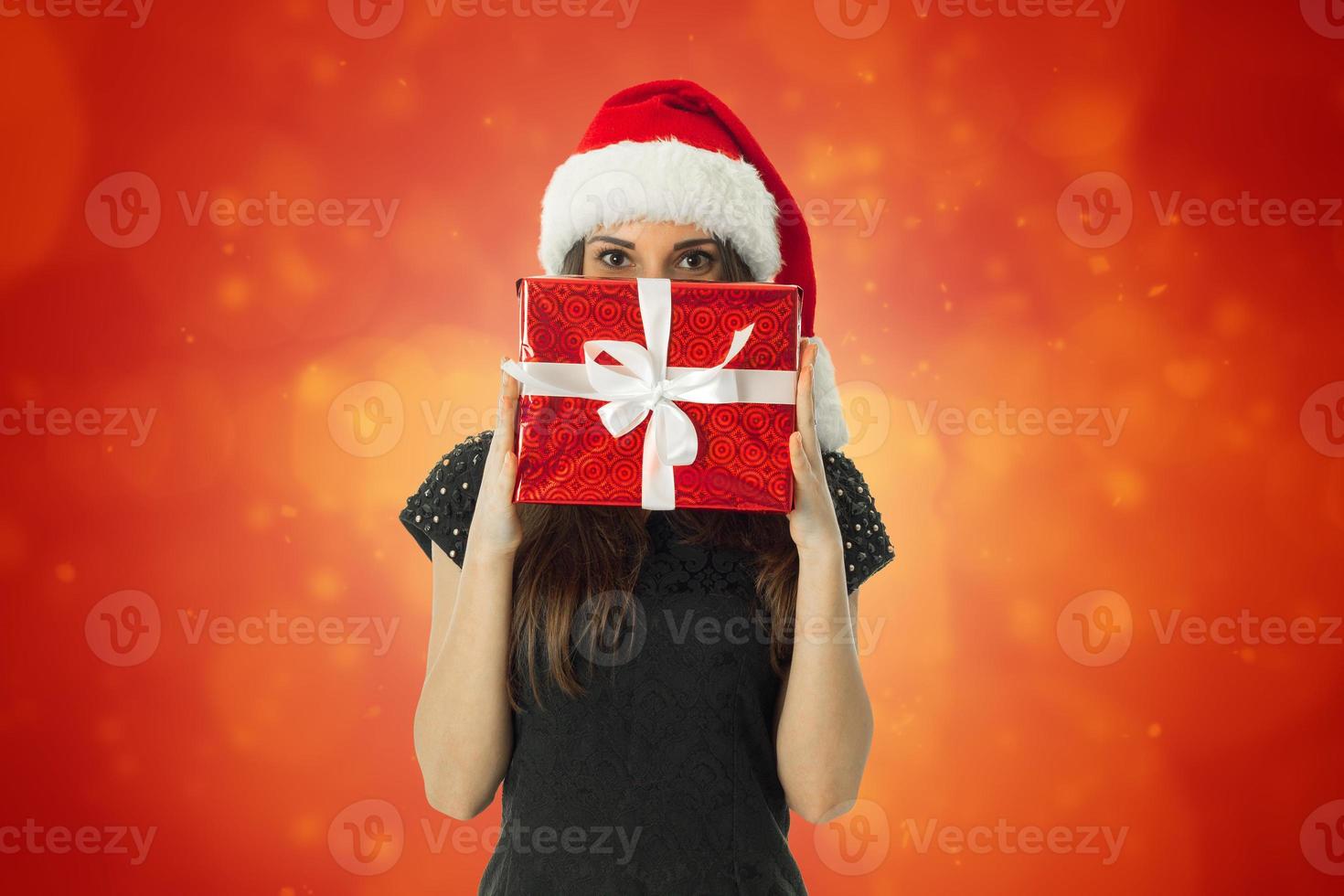 affascinante ragazza nel Santa cappello foto