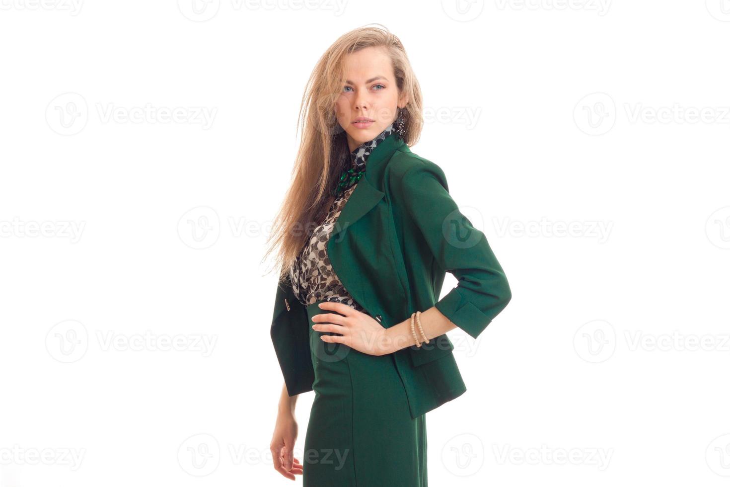 bellissima giovane bionda attività commerciale donna nel verde unifrom foto