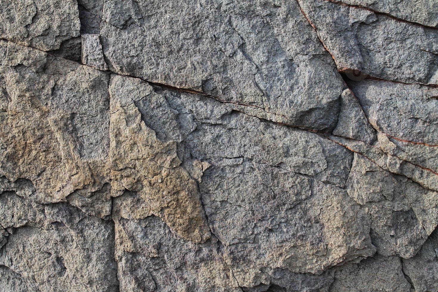 vicino su Visualizza a un' granito e pietra parete struttura nel un' alto risoluzione. foto