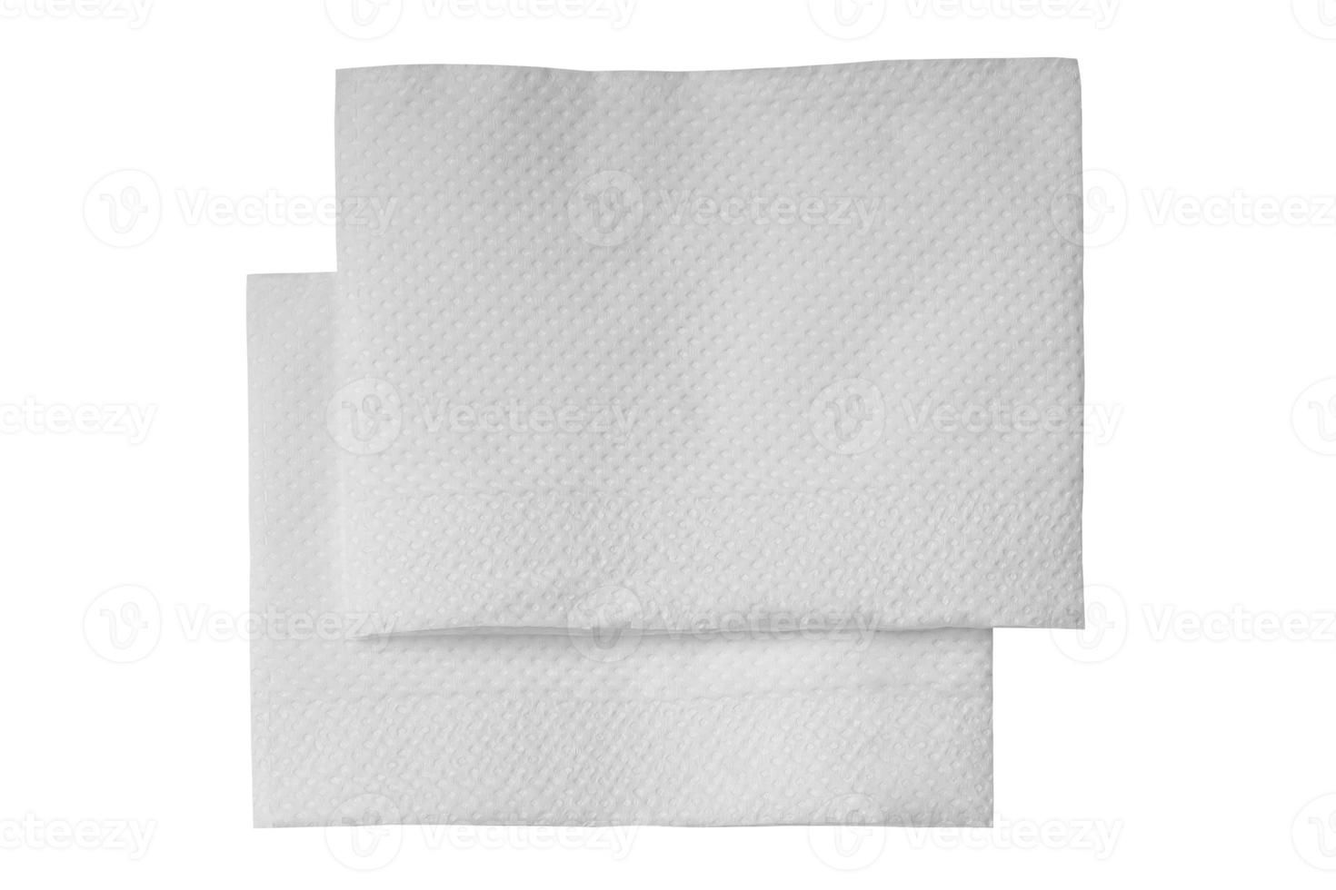 Due piegato pezzi di bianca fazzoletto di carta carta o tovagliolo nel pila isolato su bianca sfondo con ritaglio sentiero foto